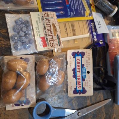 collection of assorted sewing and craft supplies.