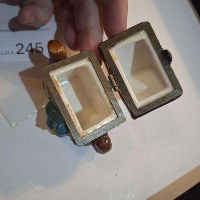 tiny teapot birdhouse trinket box.