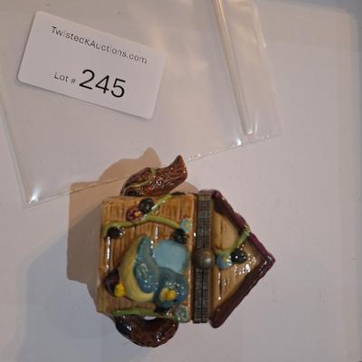 tiny teapot birdhouse trinket box.