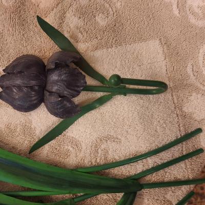 Metal and resin irisn wall hangings.