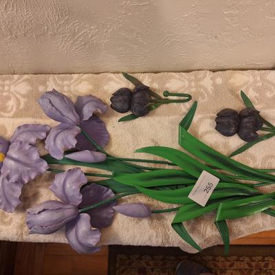 Metal and resin irisn wall hangings.