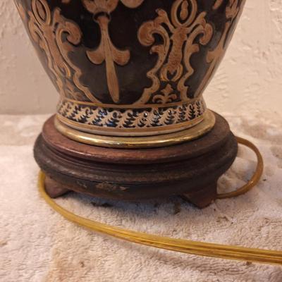 beautiful lamp with floral scroll design- the very bottom wood piece is damaged