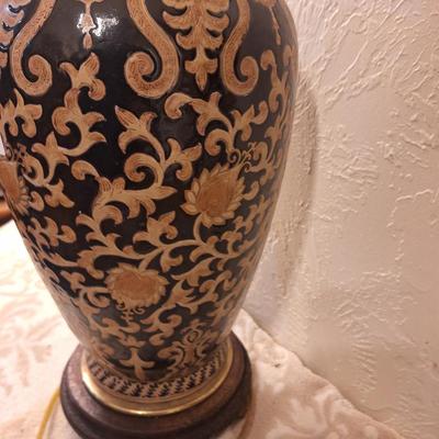 beautiful lamp with floral scroll design- the very bottom wood piece is damaged