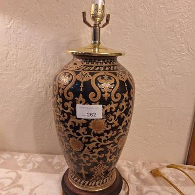 beautiful lamp with floral scroll design- the very bottom wood piece is damaged