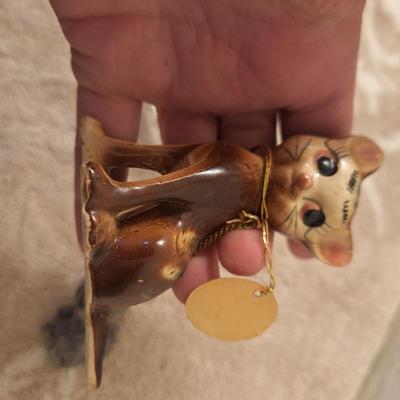 3 cat things, Indiana glass sleeping cat votive candle holder, porcelain cat with nine lives (mother only), and small resin cat