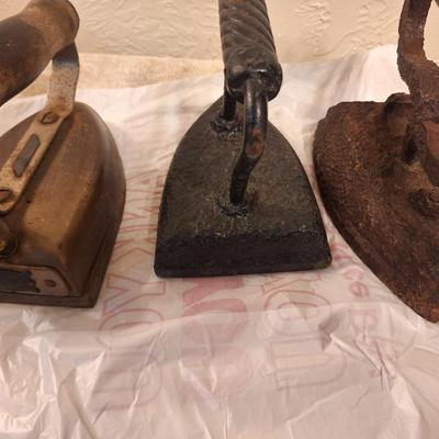 3 vintage or antique irons, one has some rust, see all photos.