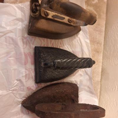 3 vintage or antique irons, one has some rust, see all photos.