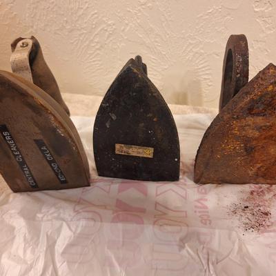 3 vintage or antique irons, one has some rust, see all photos.