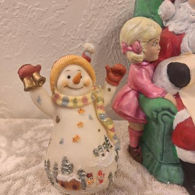 vintage ceramic Christmas figurine of Santa with two kids, and then two smaller Christmas items