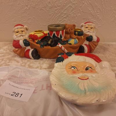 vintage ceramic santa clause candle holder and a flat ceramic dish- it has a chip on the eye