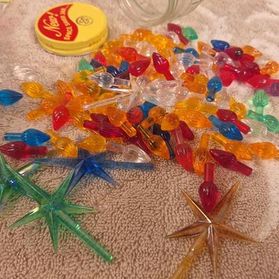 Christmass tree light peg ornaments for ceramic trees and some other kind of light pegs in the bag on the left.