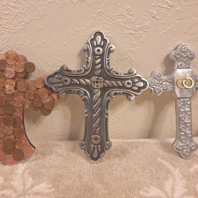 3 decorative metal crosses