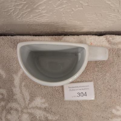 souvenir ceramic mug with the text "KENTUCKY WAS SO EXPENSIVE I COULD ONLY AFFORD HALF A CUP