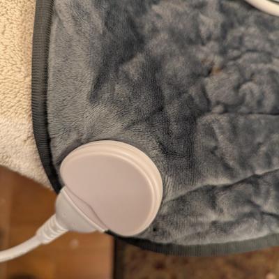 electric heating pad with a controller