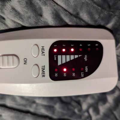 electric heating pad with a controller