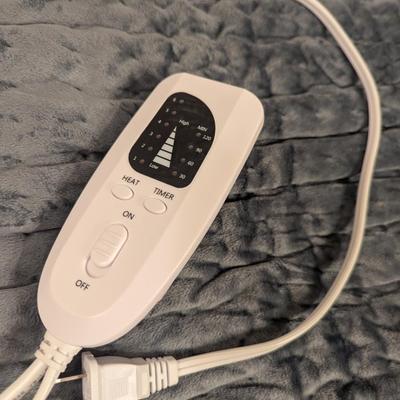 electric heating pad with a controller