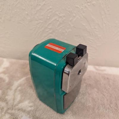 manual, desktop-style pencil sharpener.