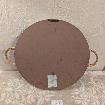 round woven seagrass or rattan decorative tray with handles.