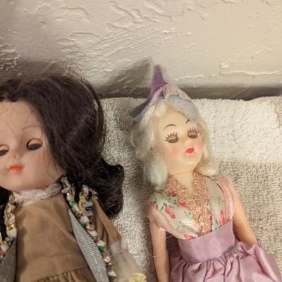 assortment of vintage dolls -