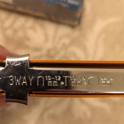 a couple of manual staple guns and a box of staples.