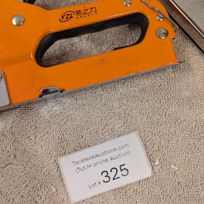 a couple of manual staple guns and a box of staples.