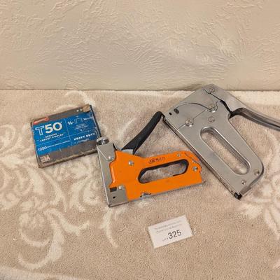 a couple of manual staple guns and a box of staples.