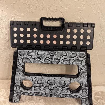 black and grey snakeskin pattern plastic folding step
