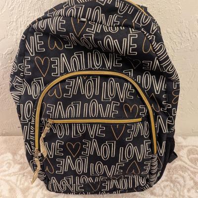Cat & Jack 17" Love Print Kids' Backpack in black and gold.