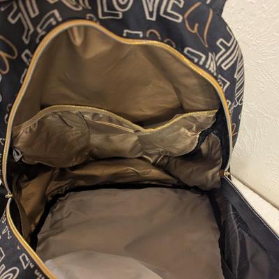 Cat & Jack 17" Love Print Kids' Backpack in black and gold.