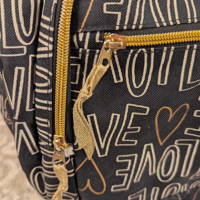 Cat & Jack 17" Love Print Kids' Backpack in black and gold.