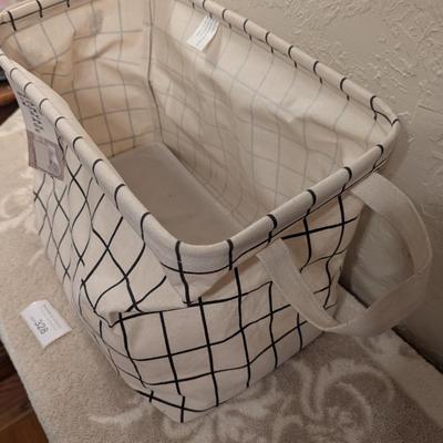 black and white grid pattern canvas storage bin.
