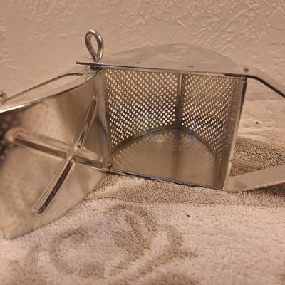 Mika stainless steel potato ricer.