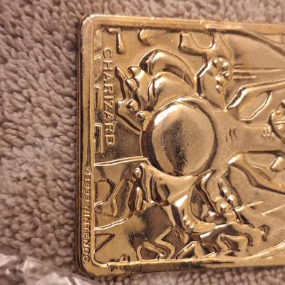 1999 Nintendo Charizard 23K gold-plated trading card, originally a promotional item from Burger King.