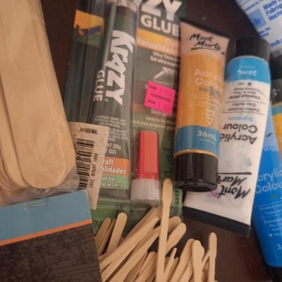 Craft supplies- hot glue, some wood sticks, a little paint and a role of jute twine