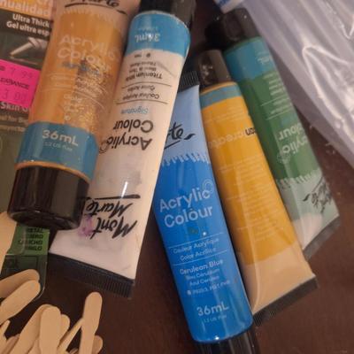 Craft supplies- hot glue, some wood sticks, a little paint and a role of jute twine