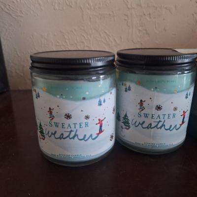 Bath & Body Works single wick scented candles. Sweater Weather, Under The Christmas Tree, and Merry Cookie.