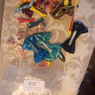 assorted hair bows, clips, and headbands.