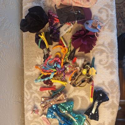 assorted hair bows, clips, and headbands.