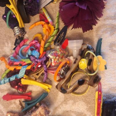 assorted hair bows, clips, and headbands.