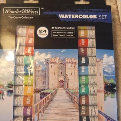 Watercolor art supplies- paints and book