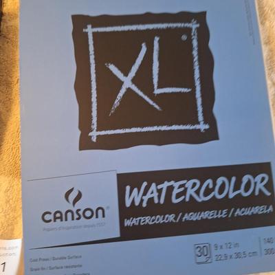 Watercolor art supplies- paints and book