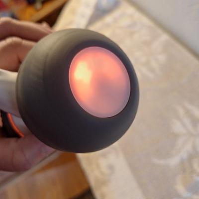 automatic interactive cat toy with a feather attachment