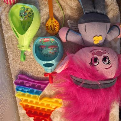 collection of toys primarily featuring characters from the DreamWorks Trolls franchise