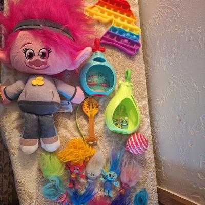 collection of toys primarily featuring characters from the DreamWorks Trolls franchise