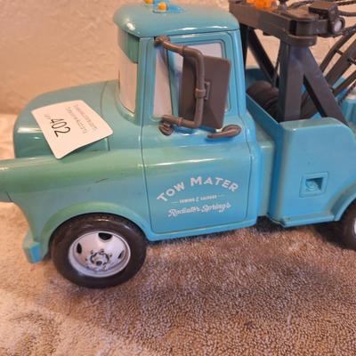  Disney Pixar Cars Tow Mater toy. This is a larger toy the auction sticker is 2 inches wide if that helps for size comparison