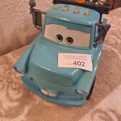  Disney Pixar Cars Tow Mater toy. This is a larger toy the auction sticker is 2 inches wide if that helps for size comparison