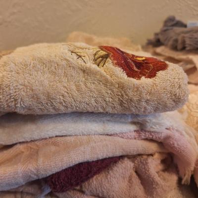 assortment of wash clothes, and hand towels.