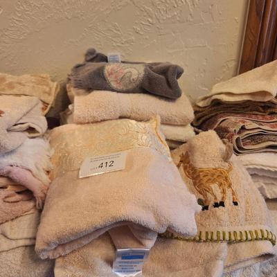 assortment of wash clothes, and hand towels.