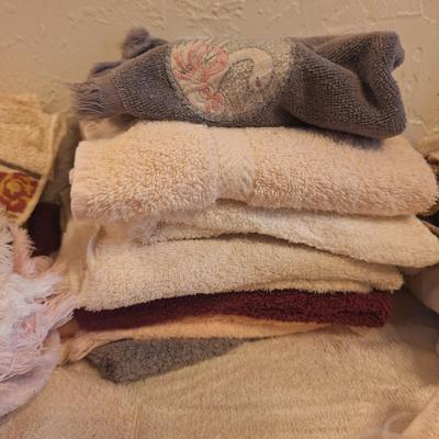 assortment of wash clothes, and hand towels.