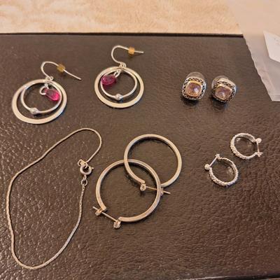 4 sets of earrings and one bracelet
